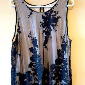 Beautiful sheer embroiled Sundance top